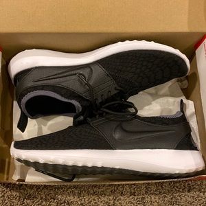 New in box Nike Juvenate black snake skin